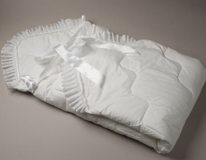 Ковдру для новонародженого в ліжечко: як вибрати, на що спиратися при виборі